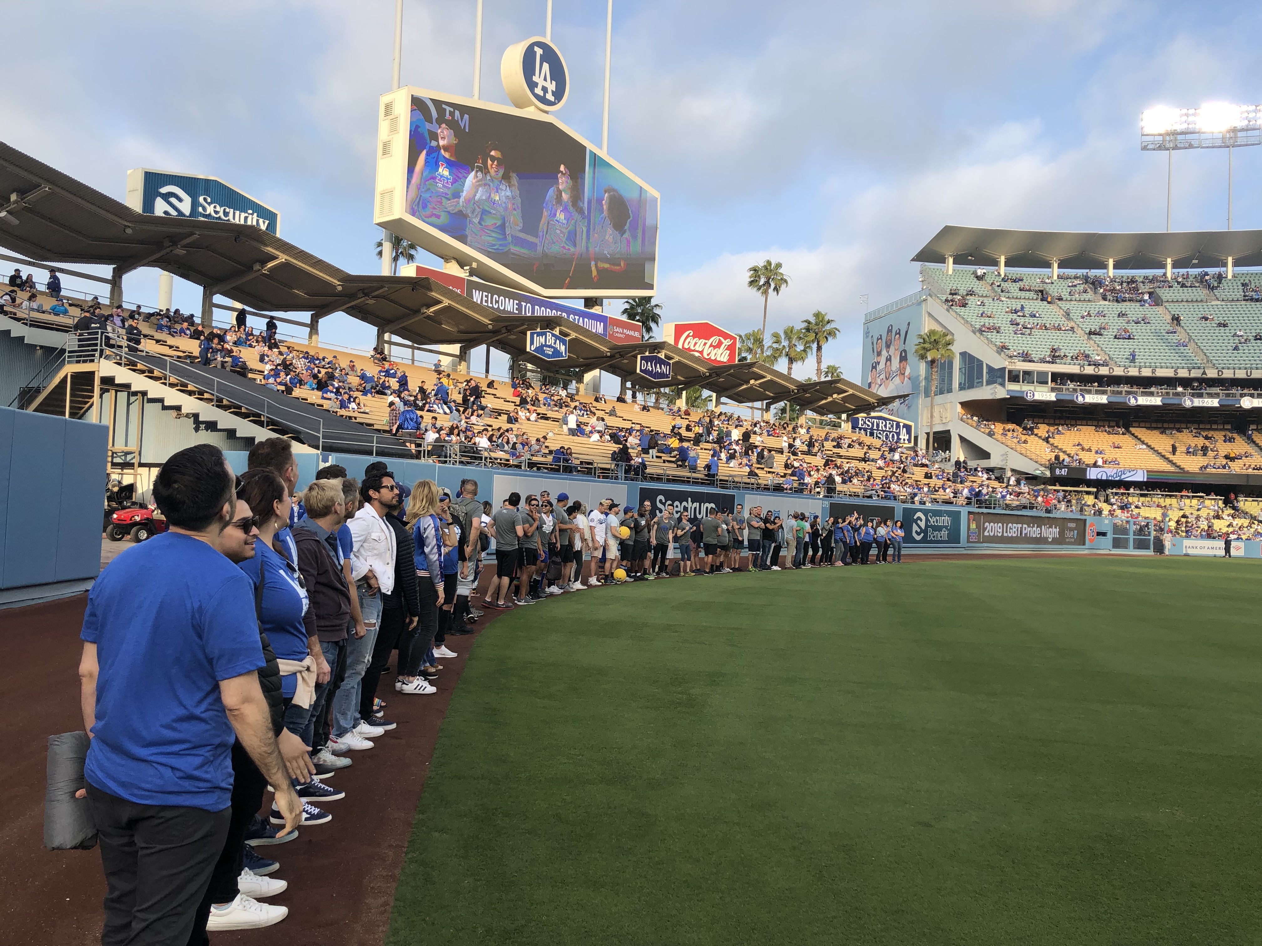 Ashli Bellinger threw the first pitch to her brother Cody on his