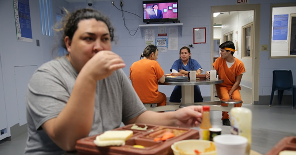 woman_eating_at_Cibola_County_Correctional_Facility_social_media_public_domain