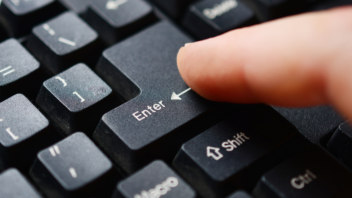 pressing_enter_button_on_keyboard_LA_insert_by_Dmitry2977_via_Bigstock