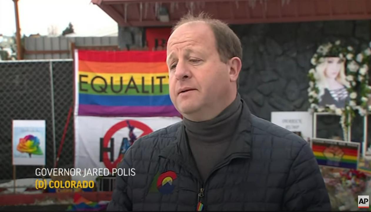 Colorado Governor Jared Polis visits Club Q and memorial to victims image pic