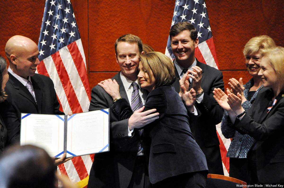 20101221_Nancy_Pelosi_hugs_Mike_Almy_insert_c_Washington_Blade_by_Michael_Key