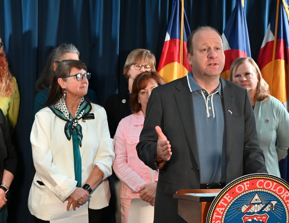 Governor Jared Polis speaks before signing trans and abortion protects