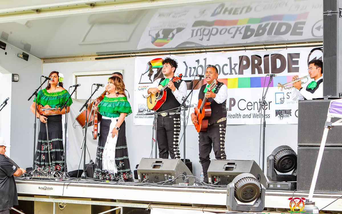 band_performing_at_2022_Lubbock_Texas_Pride_insert_by_Topher_Covarrubio_of_NeverEnding_Memories_Photography-1