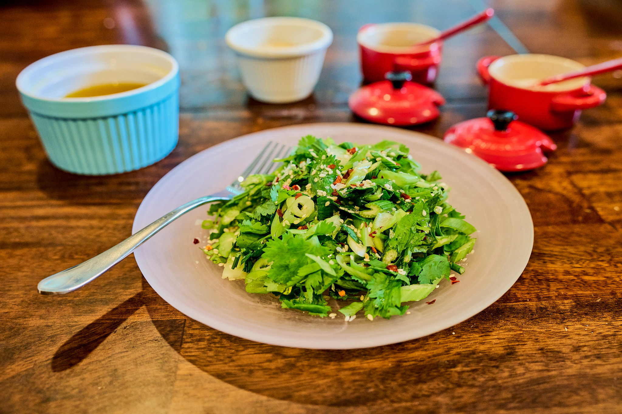 Kanes Cuisine Celery salad with cilantro, scallion, and sesame image