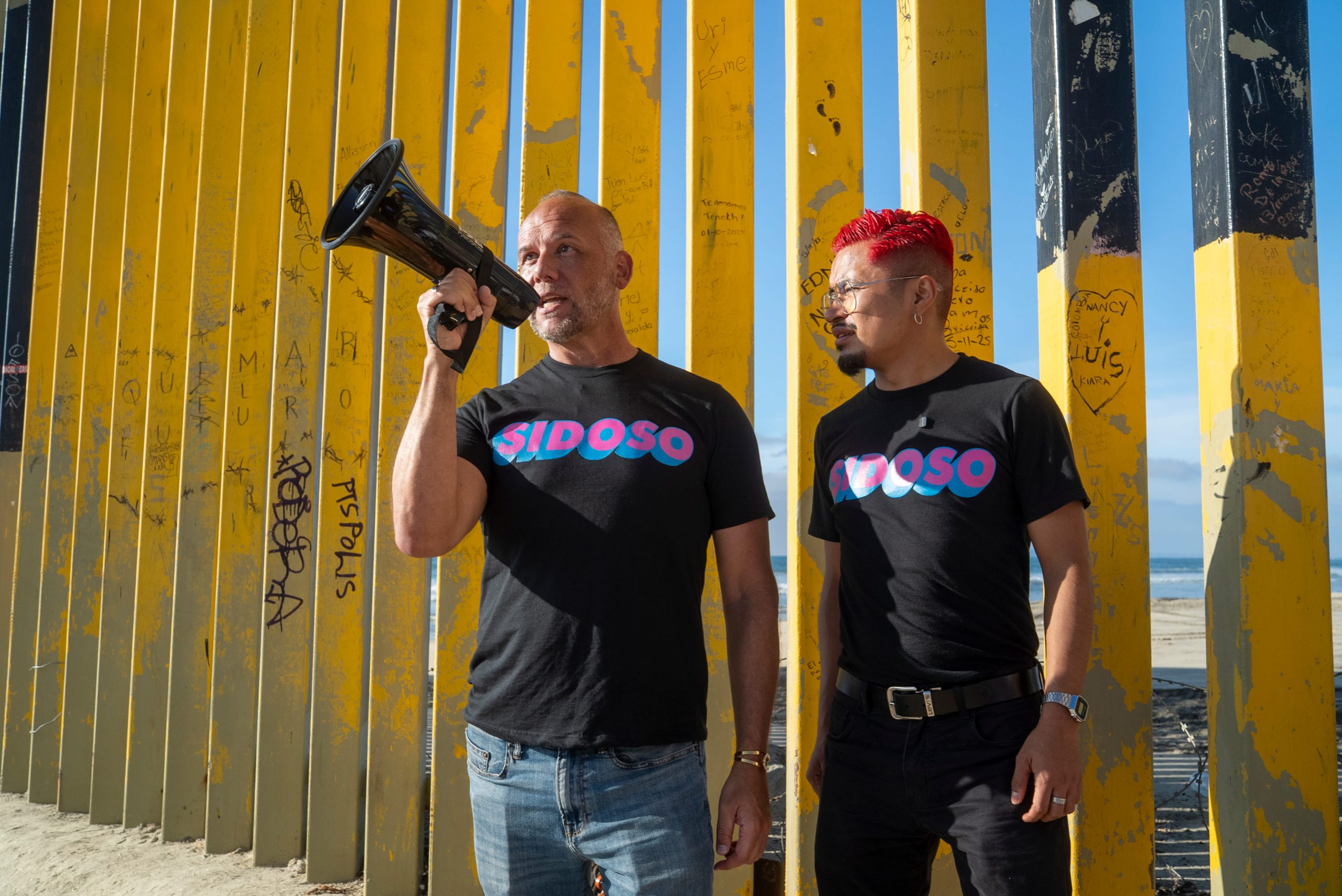Alex Garner and Axel Bautista at MPact Global Action’s Besoton Sidoso Internacional _ International HIV Kiss-In