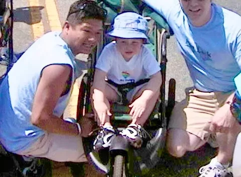 Ronald Gamboa, Dan Brandhorst and adopted son David, part of the West Hollywood Pop Luck Club contingent at CSW/LA Pride (photo by Karen Ocamb)
